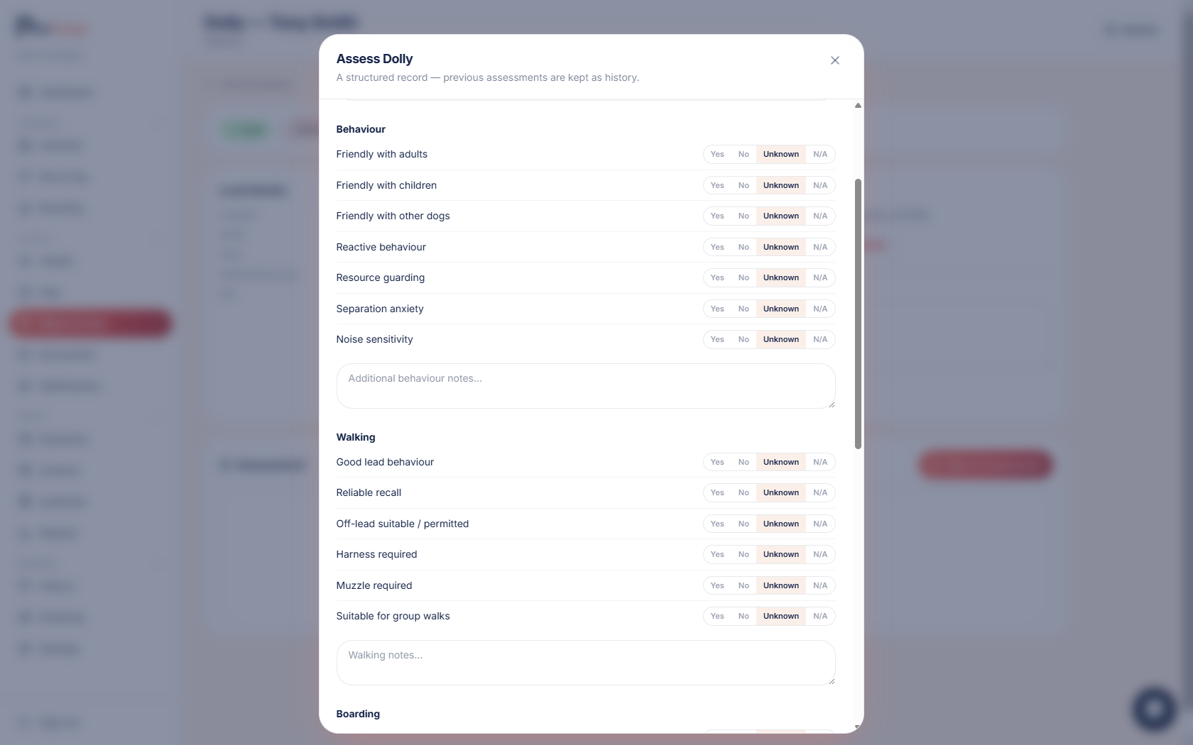 PawLoop structured pet assessment dialog with yes, no, unknown and N/A options across behaviour, walking and boarding checklists